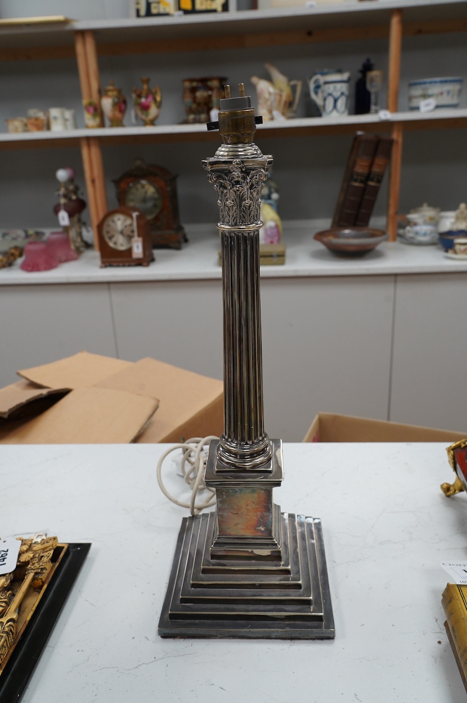 A silver plated Corinthian column table lamp, 42cm. Condition - worn, not tested as working